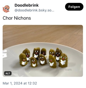 Doddlebrink: Chor Nichons.
Dazu ein Foto mit kleinen Gürkchen, beklebt mit Augen, Nase und Notenheft.